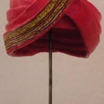 RED CERAMIC TURBAN WITH BEAD WORK